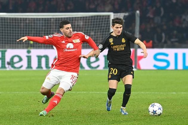 Football, Men, Season 2023 2024, UEFA Champions League Group C, Matchday 6 , 1 FC Union Berlin Real Madrid, v l Kevin Volland 1 FC Union Berlin and Fran Garcia Real Madrid in a duel , 12 12 2023, Copyright: xMatthiasxKochx