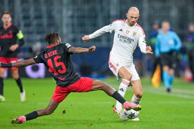 SOCCER - UEFA CL, RBS vs Benfica SALZBURG,AUSTRIA,12.DEC.23 - SOCCER - UEFA Champions League, group stage, Red Bull Salzburg vs SL Benfica. Image shows Dorgeles Nene (RBS) and Fredrik Aursnes (Benfica).  GEPAxpictures xChristianxMoser