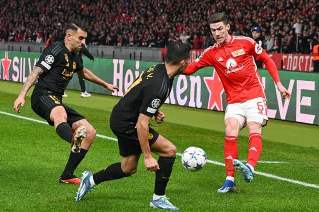 Football, Men, Season 2023 2024, UEFA Champions League Group C, Matchday 6 , 1 FC Union Berlin Real Madrid, f l Dani Ceballos Real Madrid , Lucas Vazquez Real Madrid and Robin Gosens 1 FC Union Berlin , 12 12 2023, Copyright: xMatthiasxKochx