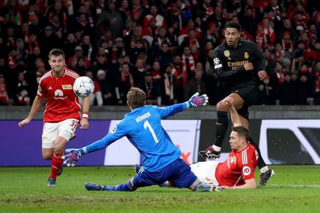 12 12 2023, xtgx, Football UEFA Champions League, Union Berlin Real Madrid emspor, v l Robin Knoche 1 FC Union Berlin Frederik Roennow 1 FC Union Berlin Jude Bellingham Real Madrid Paul Jaeckel 1 FC Union Berlin Zweikampf, Aktion, action, battle for the ball DFL DFB REGULATIONS PROHIBIT ANY USE OF PHOTOGRAPHS as IMAGE SEQUENCES and or QUASI VIDEO Berlin