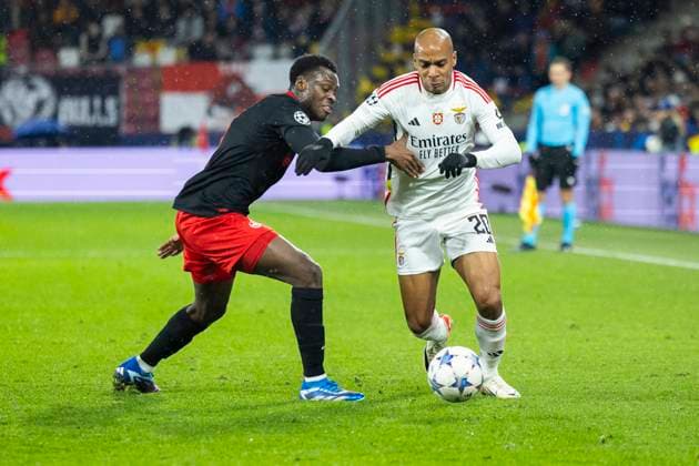 SOCCER - UEFA CL, RBS vs Benfica SALZBURG,AUSTRIA,12.DEC.23 - SOCCER - UEFA Champions League, group stage, Red Bull Salzburg vs SL Benfica. Image shows Samson Baidoo (RBS) and Joao Mario (Benfica).  GEPAxpictures xGintarexKarpaviciute