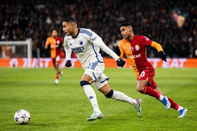 231212 Elias Achouri of FC Copenhagen and Nicolai Boilesen of Galatasaray during the UEFA Champions League football match between FC Copenhagen and Galatasaray on December 12, 2023 in Copenhagen Photo Petter Arvidson BILDBYRAN kod PA PA0704 fotboll football soccer fotball champions league fc copenhagen galatasaray bbeng  Copyright: PETTERxARVIDSON BB231212PA031