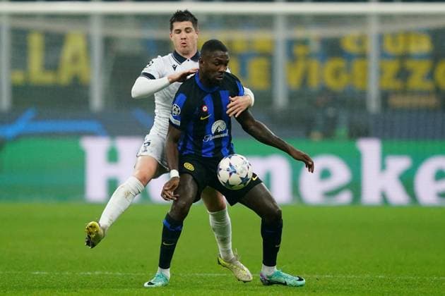Foto Spada LaPresse 12 Dicembre 2023 - Milano , Italia - calcio - Inter vs Real Sociedad - Champions League 2023 2024 - Stadio San Siro. Nella foto: Marcus Thuram (FC Inter); robin le normand (real ) December 12 , 2023 Milan , Italy - sport, calcio - Inter vs Real Sociedad Champions League 2023 2024 - San Siro Stadium . In the pic : Marcus Thuram (FC Inter); robin le normand (real )  Copyright: xSpada LaPressex