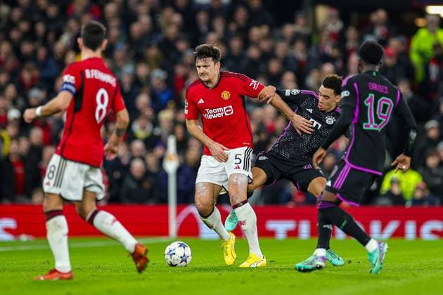 Manchester United, ManU v Bayern Munich Champions League 12 12 2023. Harry Maguire (5) of Manchester United holds his groin during the Champions League match between Manchester United and Bayern Munich at Old Trafford, Manchester, England on 12 December 2023. Editorial use only , Copyright: xNigelxKeenex PSI-18580-0031