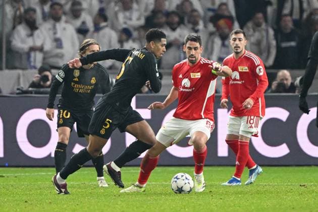 Football, Men, Season 2023 2024, UEFA Champions League Group C, Matchday 6 , 1 FC Union Berlin Real Madrid, v l Jude Bellingham Real Madrid and Rani Khedira 1 FC Union Berlin , 12 12 2023, Copyright: xMatthiasxKochx