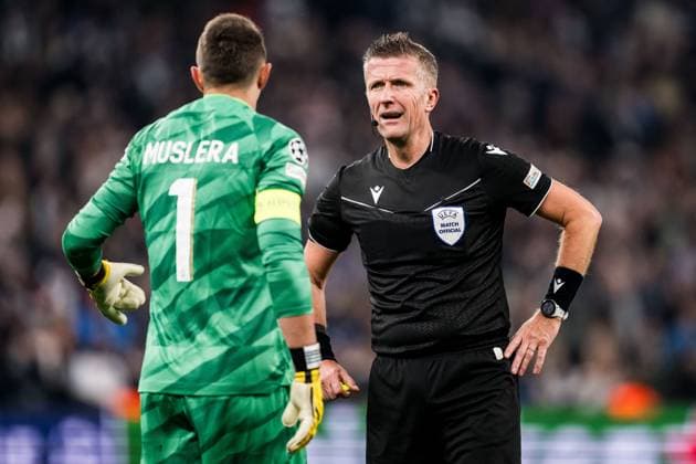 231212 Referee Daniele Orsato and goalkeeper Fernando Muslera of Galatasaray during the UEFA Champions League football match between FC Copenhagen and Galatasaray on December 12, 2023 in Copenhagen Photo Petter Arvidson BILDBYRAN kod PA PA0704 fotboll football soccer fotball champions league fc copenhagen galatasaray bbeng  Copyright: PETTERxARVIDSON BB231212PA047