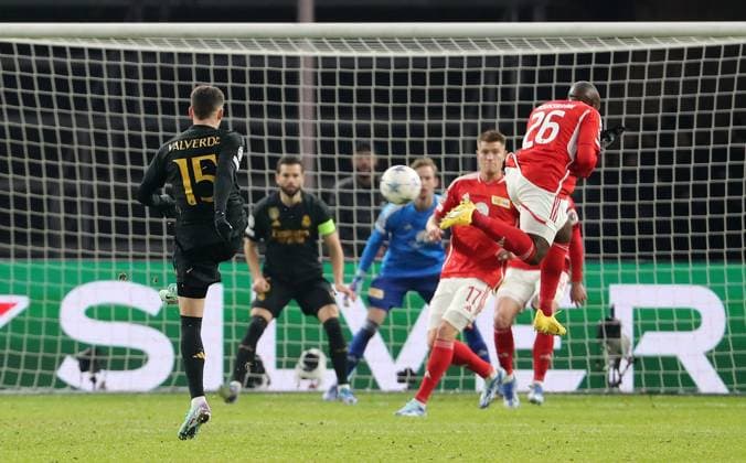 Federico Valverde, Kevin Behrens, Jerome Roussillon duel Match scene Action Sport Football Soccer UEFA Champions League UCL Men 6 Matchday Season 2023 2024 12 12 2023 1 FC Union Berlin FCU vs Real Madrid Olympiastadion DFL regulations prohibit any use of photographs as image sequences and or quasi video