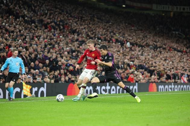 Manchester United, ManU v Bayern Munich Champions League 12 12 2023. Rasmus Hojlund (11) of Manchester United tussles with Kim Min-Jae (3) of Bayern Munich during the Champions League match between Manchester United and Bayern Munich at Old Trafford, Manchester, England on 12 December 2023. Editorial use only , Copyright: xNigelxKeenex PSI-18580-0034