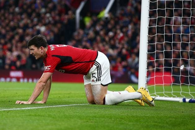 Harry Maguire of Manchester United, ManU goes down with an injury Manchester United v Bayern Munich, UEFA Champions League, Group A, Football, Old Trafford, Manchester, UK - 12 Dec 2023 EDITORIAL USE ONLY No use with unauthorised audio, video, data, fixture lists, club league logos or live services. Online in-match use limited to 120 images, no video emulation. No use in betting, games or single club league player publications. Copyright: xMattxWest Shutterstockx 14254194am