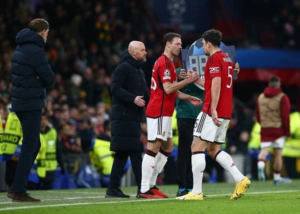 Harry Maguire of Manchester United, ManU is replaced by Jonny Evans of Manchester United Manchester United v Bayern Munich, UEFA Champions League, Group A, Football, Old Trafford, Manchester, UK - 12 Dec 2023 EDITORIAL USE ONLY No use with unauthorised audio, video, data, fixture lists, club league logos or live services. Online in-match use limited to 120 images, no video emulation. No use in betting, games or single club league player publications.  Copyright: xMattxWest Shutterstockx 14254194aq