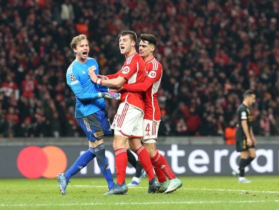 12 12 2023, Football UEFA Champions League 2023 2024, Group stage, Matchday 6, 1 FC Union Berlin Real Madrid, at Olympiastadion Berlin L R Goalkeeper Frederik Rönnow Union Berlin , Robin Knoche Union Berlin and Diogo Leite Union Berlin cheer after the saved penalty DFL and DFB regulations prohibit any use of photographs as image sequences and or quasi video