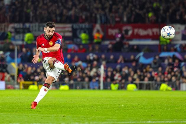 Manchester United, ManU v Bayern Munich Champions League 12 12 2023. Bruno Fernandes (8) of Manchester United shoots towards the goal during the Champions League match between Manchester United and Bayern Munich at Old Trafford, Manchester, England on 12 December 2023. Editorial use only , Copyright: xNigelxKeenex PSI-18580-0043