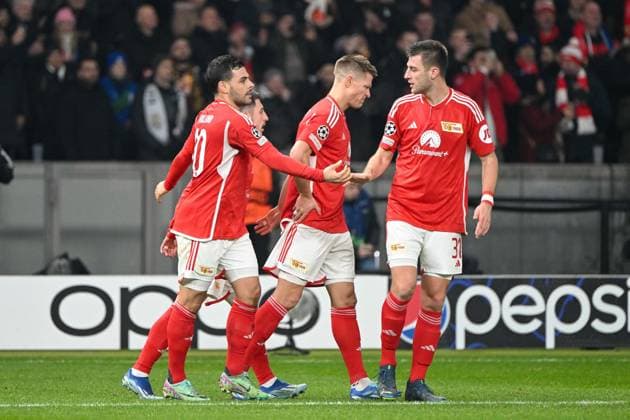 Football, Men, Season 2023 2024, UEFA Champions League Group C, Matchday 6 , 1 FC Union Berlin Real Madrid, f l Kevin Volland 1 FC Union Berlin and Robin Knoche 1 FC Union Berlin Goal celebration, cheering after the goal for 1 0 , 12 12 2023, Copyright: xMatthiasxKochx