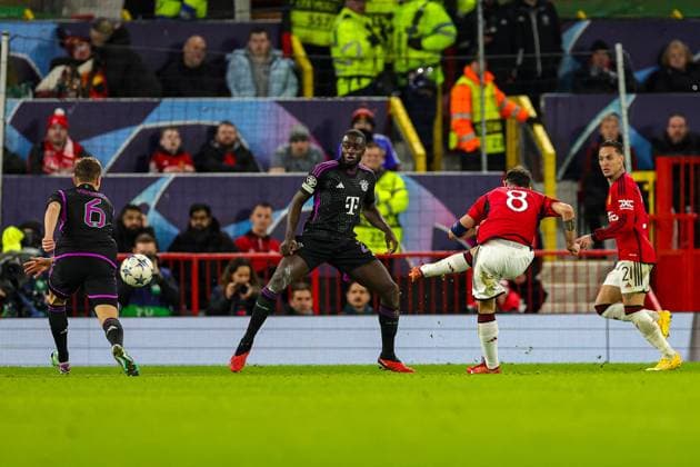 Manchester United, ManU v Bayern Munich Champions League 12 12 2023. Bruno Fernandes (8) of Manchester United shoots towards the goal during the Champions League match between Manchester United and Bayern Munich at Old Trafford, Manchester, England on 12 December 2023. Editorial use only , Copyright: xNigelxKeenex PSI-18580-0047