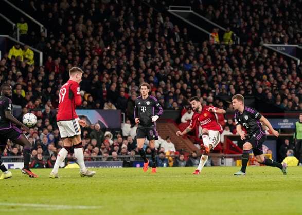 Manchester, England, 12th December 2023. Bruno Fernandes of Manchester United, ManU takes a shot on goal during the UEFA Champions League match at Old Trafford, Manchester. Picture credit should read: Andrew Yates Sportimage EDITORIAL USE ONLY. No use with unauthorised audio, video, data, fixture lists, club league logos or live services. Online in-match use limited to 120 images, no video emulation. No use in betting, games or single club league player publications. SPI-2800-0033