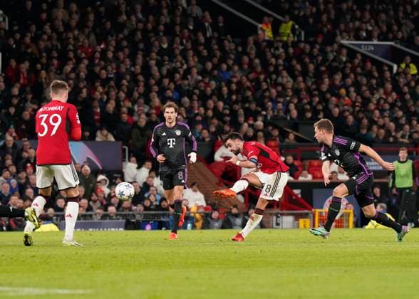 Manchester, England, 12th December 2023. Bruno Fernandes of Manchester United, ManU takes a shot on goal during the UEFA Champions League match at Old Trafford, Manchester. Picture credit should read: Andrew Yates Sportimage EDITORIAL USE ONLY. No use with unauthorised audio, video, data, fixture lists, club league logos or live services. Online in-match use limited to 120 images, no video emulation. No use in betting, games or single club league player publications. SPI-2800-0034