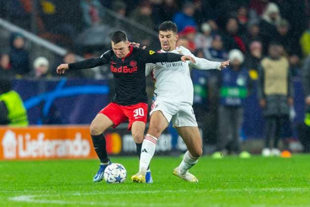 SOCCER - UEFA CL, RBS vs Benfica SALZBURG,AUSTRIA,12.DEC.23 - SOCCER - UEFA Champions League, group stage, Red Bull Salzburg vs SL Benfica. Image shows Oscar Gloukh (RBS) and Tomas Araujo (Benfica).  GEPAxpictures xGintarexKarpaviciute