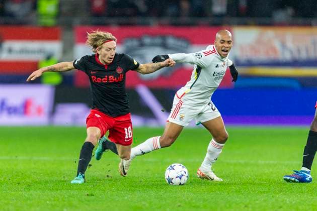 SOCCER - UEFA CL, RBS vs Benfica SALZBURG,AUSTRIA,12.DEC.23 - SOCCER - UEFA Champions League, group stage, Red Bull Salzburg vs SL Benfica. Image shows Mads Bidstrup (RBS) and Joao Mario (Benfica).  GEPAxpictures xGintarexKarpaviciute