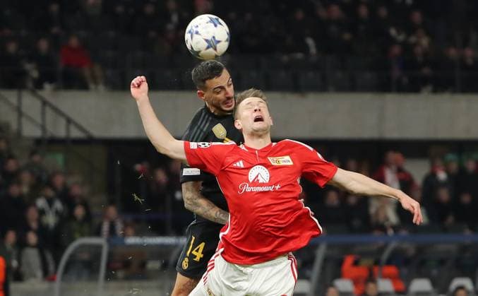Joselu, Paul Jaeckel duel Match scene Action Sport Football Soccer UEFA Champions League UCL Men 6 Matchday Season 2023 2024 12 12 2023 1 FC Union Berlin FCU vs Real Madrid Olympiastadion DFL regulations prohibit any use of photographs as image sequences and or quasi video