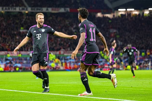Manchester United, ManU v Bayern Munich Champions League 12 12 2023. Goal 0-1 Kingsley Coman (11) of Bayern Munich scores a goal and celebrates with Harry Kane (9) of Bayern Munich during the Champions League match between Manchester United and Bayern Munich at Old Trafford, Manchester, England on 12 December 2023. Editorial use only , Copyright: xNigelxKeenex PSI-18580-0060