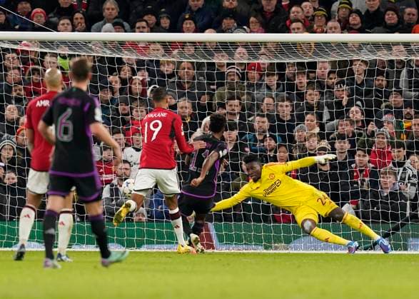 Manchester, England, 12th December 2023. Kingsley Coman of Bayern Munich scores their first goal during the UEFA Champions League match at Old Trafford, Manchester. Picture credit should read: Andrew Yates Sportimage EDITORIAL USE ONLY. No use with unauthorised audio, video, data, fixture lists, club league logos or live services. Online in-match use limited to 120 images, no video emulation. No use in betting, games or single club league player publications. SPI-2800-0039