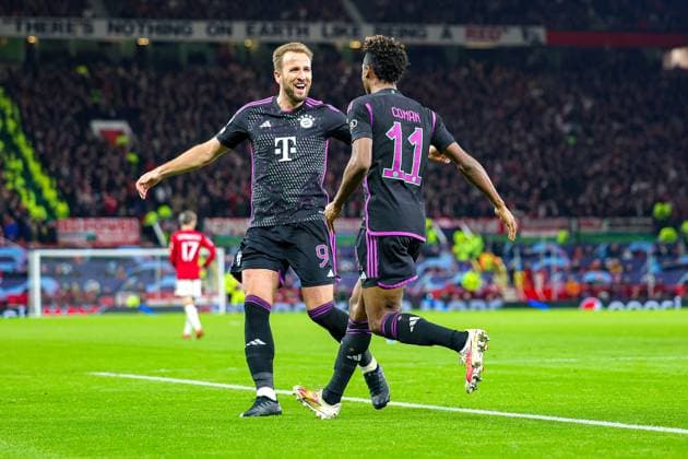 Manchester United, ManU v Bayern Munich Champions League 12 12 2023. Goal 0-1 Kingsley Coman (11) of Bayern Munich scores a goal and celebrates with Harry Kane (9) of Bayern Munich during the Champions League match between Manchester United and Bayern Munich at Old Trafford, Manchester, England on 12 December 2023. Editorial use only , Copyright: xNigelxKeenex PSI-18580-0061