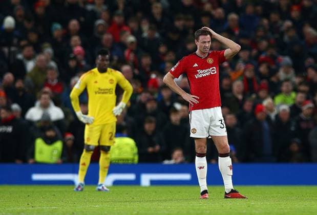 Jonny Evans of Manchester United, ManU looks dejected after conceding a goal Manchester United v Bayern Munich, UEFA Champions League, Group A, Football, Old Trafford, Manchester, UK - 12 Dec 2023 EDITORIAL USE ONLY No use with unauthorised audio, video, data, fixture lists, club league logos or live services. Online in-match use limited to 120 images, no video emulation. No use in betting, games or single club league player publications.  Copyright: xMattxWest Shutterstockx 14254194bm