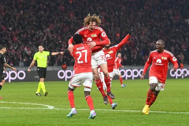 Football, Men, Season 2023 2024, UEFA Champions League Group C, Matchday 6 , 1 FC Union Berlin Real Madrid, f l Sheraldo Becker 1 FC Union Berlin , Alex Kral 1 FC Union Berlin and Jerome Roussillon 1 FC Union Berlin Goal celebration, celebrating after the goal to 2 2 , 12 12 2023, Copyright: xMatthiasxKochx
