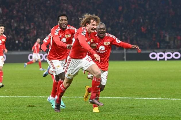Football, Men, Season 2023 2024, UEFA Champions League Group C, Matchday 6 , 1 FC Union Berlin Real Madrid, f l Sheraldo Becker 1 FC Union Berlin , Alex Kral 1 FC Union Berlin and Jerome Roussillon 1 FC Union Berlin Goal celebration, celebrating after the goal to 2 2 , 12 12 2023, Copyright: xMatthiasxKochx