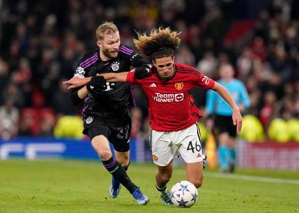 Manchester, England, 12th December 2023. Konrad Laimer of Bayern Munich and Hannibal Mejbri of Manchester United, ManU during the UEFA Champions League match at Old Trafford, Manchester. Picture credit should read: Andrew Yates Sportimage EDITORIAL USE ONLY. No use with unauthorised audio, video, data, fixture lists, club league logos or live services. Online in-match use limited to 120 images, no video emulation. No use in betting, games or single club league player publications. SPI-2800-0050