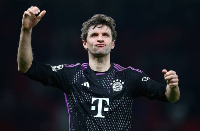 Thomas Müller of Bayern Munich celebrates winning the game at full time Manchester United, ManU v Bayern Munich, UEFA Champions League, Group A, Football, Old Trafford, Manchester, UK - 12 Dec 2023 EDITORIAL USE ONLY No use with unauthorised audio, video, data, fixture lists, club league logos or live services. Online in-match use limited to 120 images, no video emulation. No use in betting, games or single club league player publications.  Copyright: xMattxWest Shutterstockx 14254194by