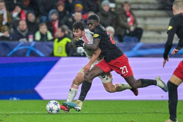SOCCER - UEFA CL, RBS vs Benfica SALZBURG,AUSTRIA,12.DEC.23 - SOCCER - UEFA Champions League, group stage, Red Bull Salzburg vs SL Benfica. Image shows Lucas Gourna-Douath (RBS) and Joao Neves (Benfica).  GEPAxpictures xChristianxMoser