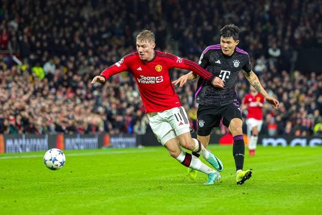Manchester United, ManU v Bayern Munich Champions League 12 12 2023. Rasmus Hojlund (11) of Manchester United battles with Kim Min-Jae (3) of Bayern Munich during the Champions League match between Manchester United and Bayern Munich at Old Trafford, Manchester, England on 12 December 2023. Editorial use only , Copyright: xNigelxKeenex PSI-18580-0080