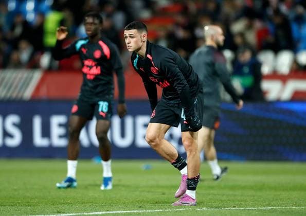 Phil Foden of Manchester City during warm up Crvena zvezda v Manchester City, UEFA Champions League, Group G, Football, Rajko Mitic Stadium, Belgrade, Serbia - 13 Dec 2023 EDITORIAL USE ONLY No use with unauthorised audio, video, data, fixture lists, club league logos or live services. Online in-match use limited to 120 images, no video emulation. No use in betting, games or single club league player publications. Copyright: xNikolaxKrstic Shutterstockx 14254230r