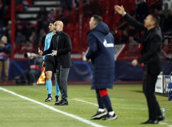 Manchester City manager Pep Guardiola instructs his players from the sideline Crvena zvezda v Manchester City, UEFA Champions League, Group G, Football, Rajko Mitic Stadium, Belgrade, Serbia - 13 Dec 2023 EDITORIAL USE ONLY No use with unauthorised audio, video, data, fixture lists, club league logos or live services. Online in-match use limited to 120 images, no video emulation. No use in betting, games or single club league player publications. Copyright: xNikolaxKrstic Shutterstockx 14254230ac