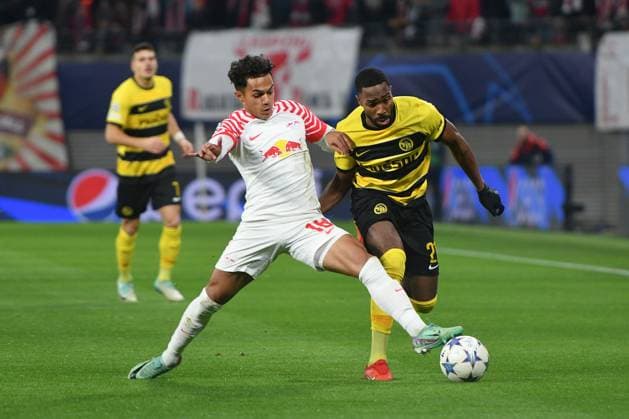 Fabio Carvalho RB Leipzig left and Ulisses Garcia BSC Young Boys right RB Leipzig vs BSC Young Boys, Football, Champions League, Preliminary Round, Matchday 6, Season 2023 2024, 13 12 2023 DFB DFL REGULATIONS PROHIBIT ANY USE OF PHOTOGRAPHS AS IMAGE SEQUENCES AND OR QUASI VIDEO RB Leipzig vs BSC Young Boys, Football, Champions League, Preliminary Round, Matchday 6, Season 2023 2024, 13 12 2023 Leipzig Copyright: xEibner-Pressefoto BertxHarzerx EP_BHR