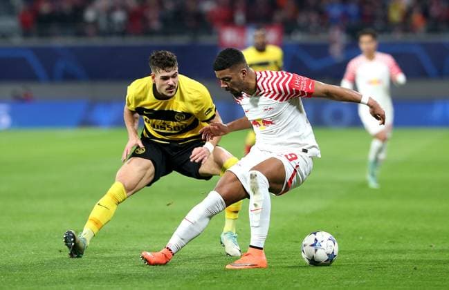 13 12 2023, Football UEFA Champions League 2023 2024, Group stage, Matchday 6, RB Leipzig BSC Young Boys Bern, at Red Bull Arena Leipzig L R Filip Ugrinic BSC Young Boys vs Benjamin Henrichs RB Leipzig DFL and DFB regulations prohibit any use of photographs as image sequences and or quasi video