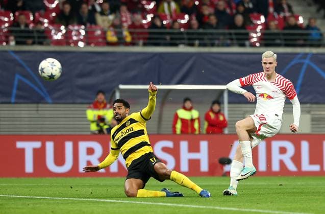 13 12 2023, Football UEFA Champions League 2023 2024, Group stage, Matchday 6, RB Leipzig BSC Young Boys Bern, at Red Bull Arena Leipzig Goal for 1 0, L R Saidy Janko BSC Young Boys against scorer Benjamin Sesko RB Leipzig DFL and DFB regulations prohibit any use of photographs as image sequences and or quasi video