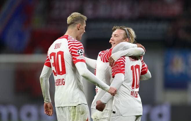 13 12 2023, Football UEFA Champions League 2023 2024, group stage, matchday 6, RB Leipzig BSC Young Boys Bern, at Red Bull Arena Leipzig cheering L R Benjamin Sesko RB Leipzig and scorer Emil Forsberg RB Leipzig to score 2 1 DFL and DFB regulations prohibit any use of photographs as image sequences and or quasi video
