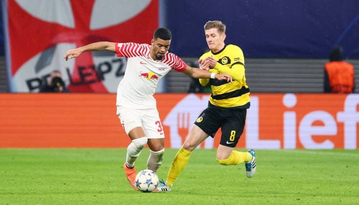 RB Leipzig Young Boys Bern Champions League Leipzig, 13 12 2023, Red Bull Arena, Football , UEFA Champions League, Group G , Matchday 6, RB Leipzig vs Young Boys Bern , Pictured from left Benjamin Henrichs 39, RB Leipzig , Lukasz Lakomy 8, Bern , Photo for editorial use only , UEFA regulations prohibit any use of photographs as image sequences and or quasi video ,