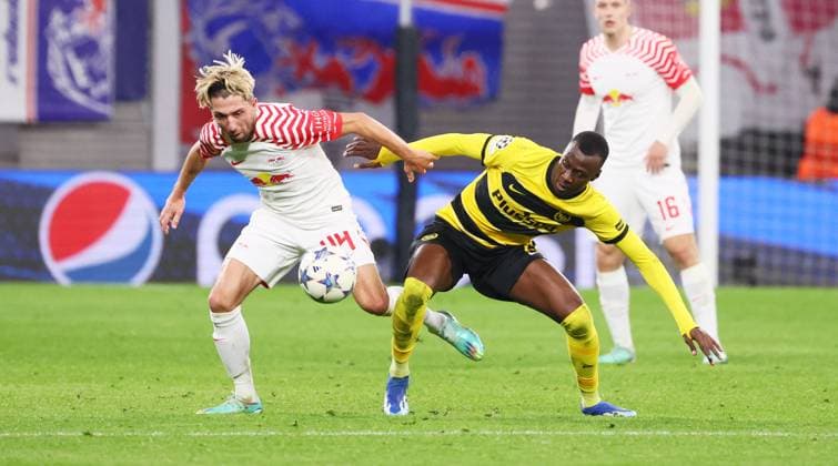 RB Leipzig Young Boys Bern Champions League Leipzig, 13 12 2023, Red Bull Arena, Football , UEFA Champions League, Group G , Matchday 6, RB Leipzig vs Young Boys Bern , Pictured from left Kevin Kampl 44, RB Leipzig , Cheikh Niasse 20, Bern , Photo for editorial use only , UEFA regulations prohibit any use of photographs as image sequences and or quasi video ,