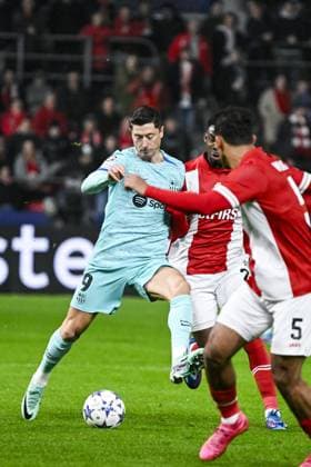 Barcelona s Robert Lewandowski and Antwerp s Mandela Keita pictured in action during a game between Belgian soccer team Royal Antwerp FC and Spanish club FC Barcelona, Barca in Antwerp, on Wednesday 13 December 2023, day six of the Champions League group stage, in group H. TOM GOYVAERTS TomxGoyvaerts  x82273906x