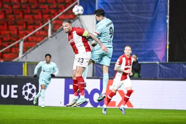 Antwerp s Toby Alderweireld and Barcelona s Robert Lewandowski pictured in action during a game between Belgian soccer team Royal Antwerp FC and Spanish club FC Barcelona, Barca in Antwerp, on Wednesday 13 December 2023, day six of the Champions League group stage, in group H. TOM GOYVAERTS TomxGoyvaerts  x82274537x