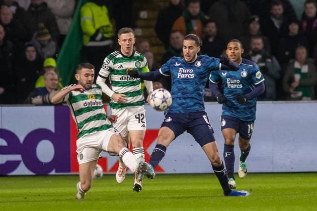 Celtic v Feyenoord Champions League 13 12 2023. Ramiz Zerrouki of Feyenoord tries to intercept the ball from Greg Taylor of Celtic FC during the Champions League Matchday 6, Celtic FC vs Feyenoord, Celtic Park, Parkhead, Glasgow, 13 12 2023. Editorial use only , Copyright: xColinxPoultneyx PSI-18592-0001