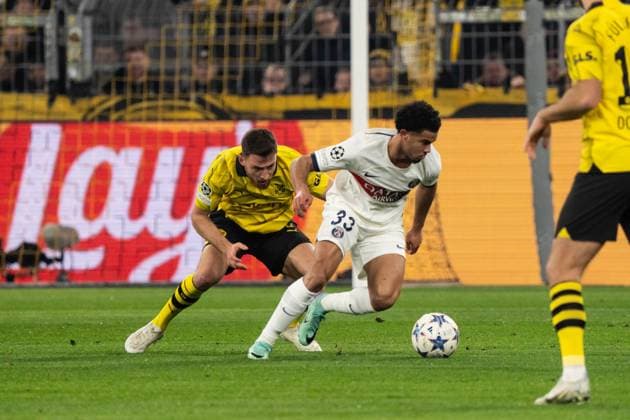 GER, Champions League, Borussia Dortmund vs Paris Saint Germain 13 12 2023, Signal Iduna Park, Dortmund, GER, Champions League, Borussia Dortmund vs Paris Saint Germain In the picture duel between Salih Özcan BV Borussia Dortmund, 6 and Warren Zaire Emery Paris Saint Germain, 33 nordphotoxGmbHxx xChristianxSchulze nph000300