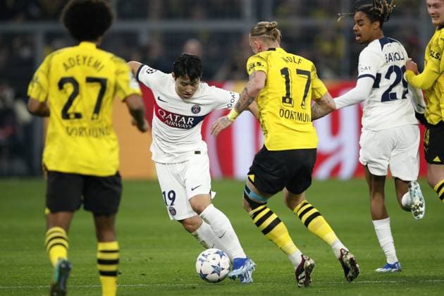 DORTMUND - (l-r) Kang-in Lee of Paris Saint-Germain,Marius Wolf of Borussia Dortmund during the UEFA Champions League Group F match between Borussia Dortmund and Paris Saint-Germain at the Signal Iduna Park on December 13, 2023 in Dortmund, Germany . ANP Hollandse Hoogte Bart Stoutjesdijk UEFA Champions League 2023 24 2023 2024 xVIxANPxSportx xBartxStoutjesdijkxIVx 486219519 originalFilename: 486219519.jpg