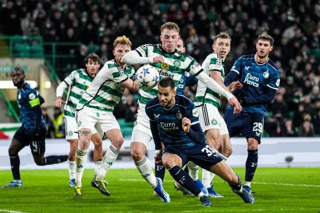 UEFA Champions League: Celtic v Feyenoord Glasgow - Stephen Welsh of Celtic, David Hancko of Feyenoord during the 6th leg of the UEFA Champions League group stage between Celtic v Feyenoord at Celtic Park on 13 December 2023 in Glasgow, Scotland. Copyright: xTomxBodex