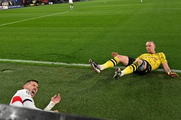 13 12 2023, xsltx, Football UEFA Champions League, Borussia Dortmund Paris St Germain PSG emspor, v l Marius Wolf Borussia Dortmund Lucas Hernandez FC Paris Saint Germain duel, action, action, battle for the ball DFL DFB REGULATIONS PROHIBIT ANY USE OF PHOTOGRAPHS as IMAGE SEQUENCES and or QUASI VIDEO Dortmund
