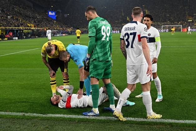 13 12 2023, xsltx, Football UEFA Champions League, Borussia Dortmund Paris St Germain PSG emspor, v l Lucas Hernandez FC Paris Saint Germain injured Injury with pain on the ground Referee Referee Nyberg, Glenn Sweden DFL DFB REGULATIONS PROHIBIT ANY USE OF PHOTOGRAPHS as IMAGE SEQUENCES and or QUASI VIDEO Dortmund
