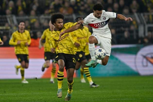 from left in duel Karim Adeyemi 27, Borussia Dortmund Warren Zaire Emery 33, Paris Saint Germain 13 12 2023 Soccer, Champions League, Borussia Dortmund vs Paris St Germain, Signal Iduna Park, Dortmund, NRW Germany Copyright: xpepphotox xHorstxMauelshagenx pep00321, pep_20231213_hm